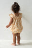 US stockist of Illoura the Label's Buttercup Print Opie Romper