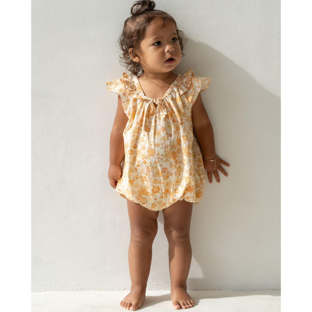 US stockist of Illoura the Label's Buttercup Print Opie Romper