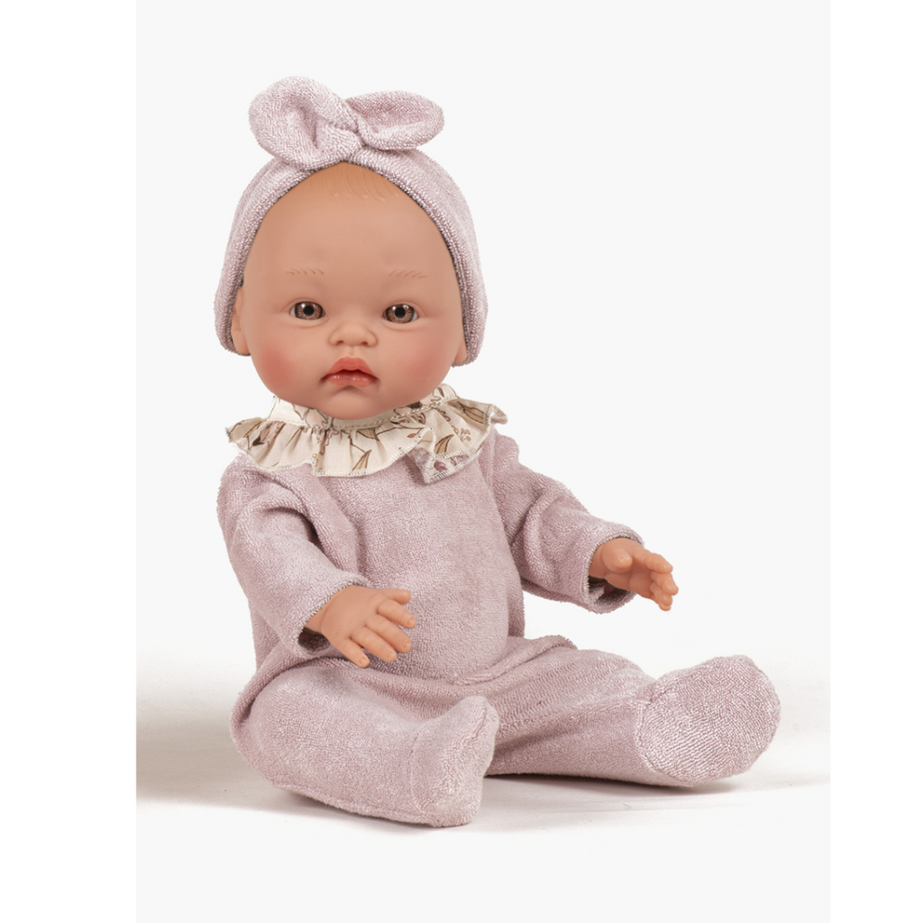 US stockist of Minikane's Olympus Cuties doll dressed in a Petal sleepsuit with matching headband