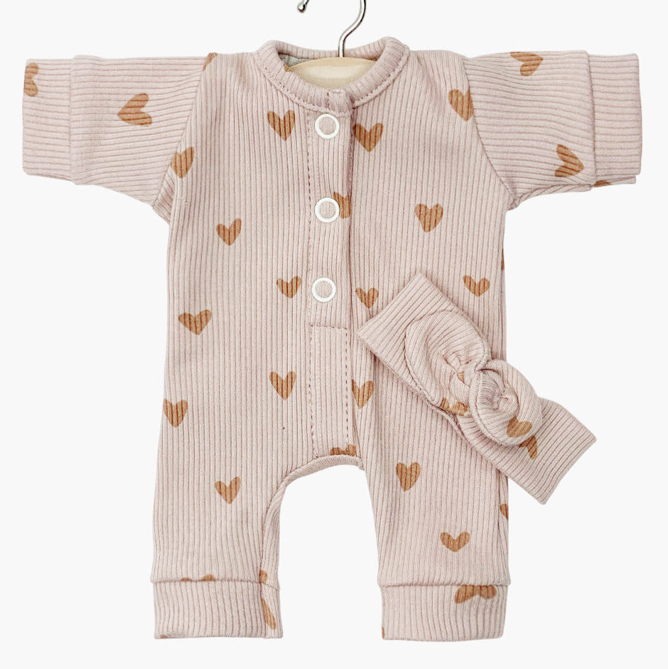 US stockist of Minikane's Babies Ribbed knit jumpsuit in pink hearts with matching headband.