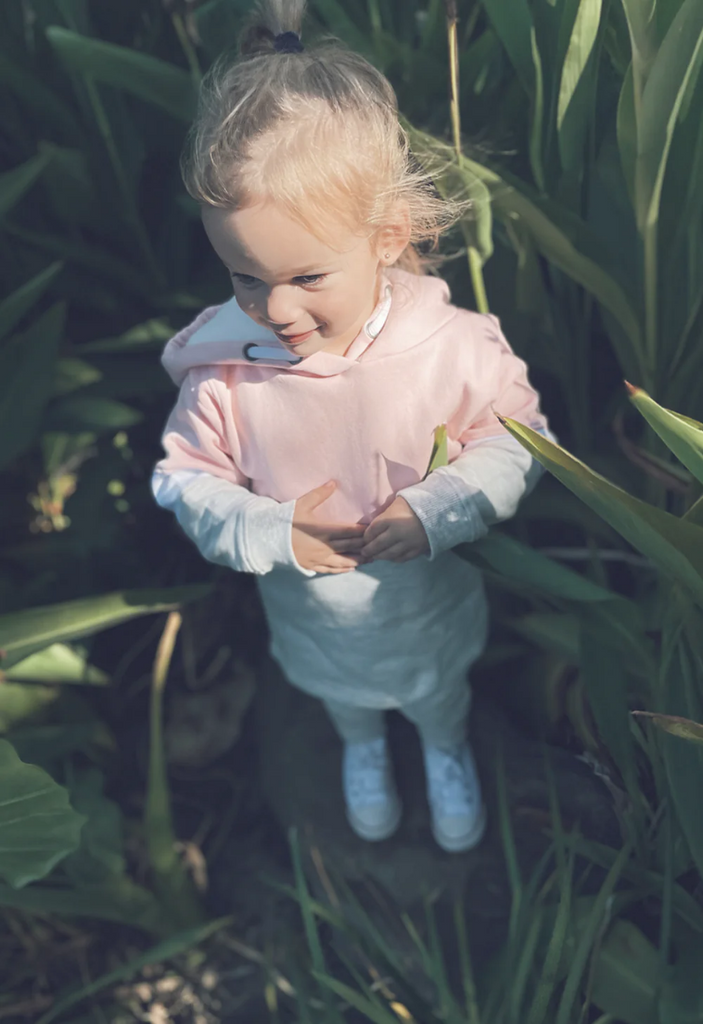 US stockist of Five O'Six' Baby Pink color block sherpa hooded sweatshirt